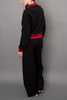 cozy black pullover with red racer stripe detailing.