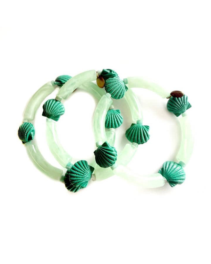 beaded bracelet with wide green beads and shell details