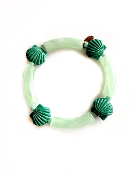 beaded bracelet with wide green beads and shell details