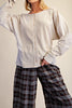 soft button down top in ecru with special detailing throughout