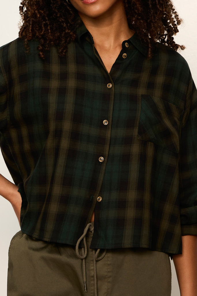 lightweight button down flannel top in a forest green plaid pattern