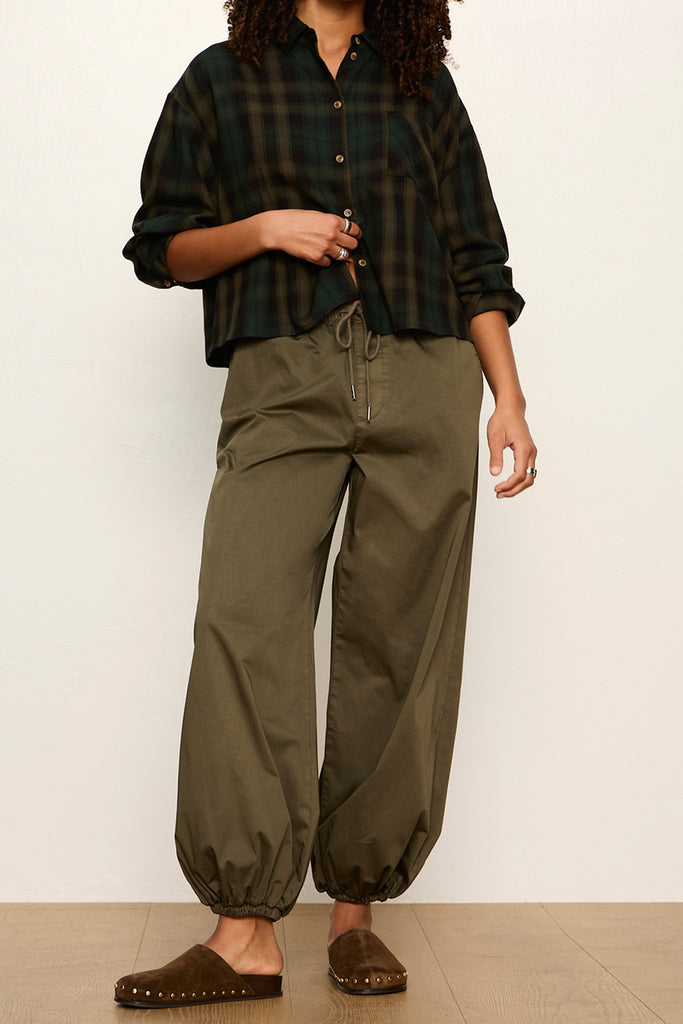 lightweight button down flannel top in a forest green plaid pattern