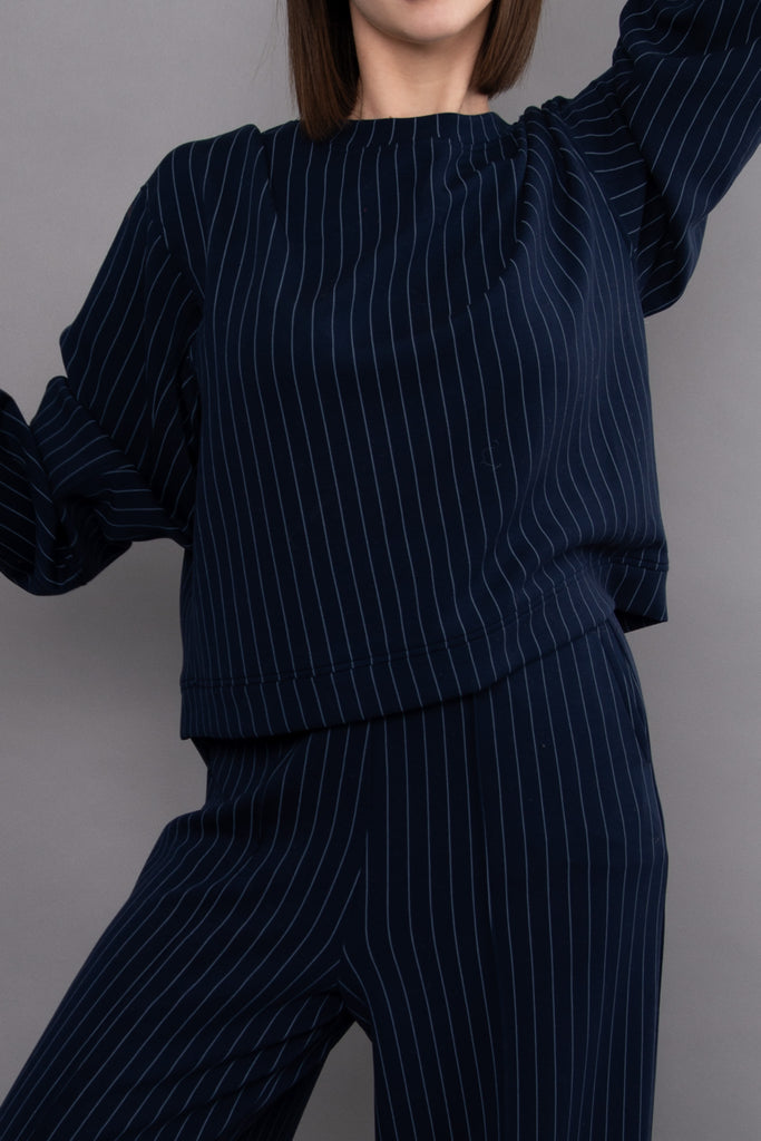 elevated navy blue and pale blue striped pullover with a boxy fit