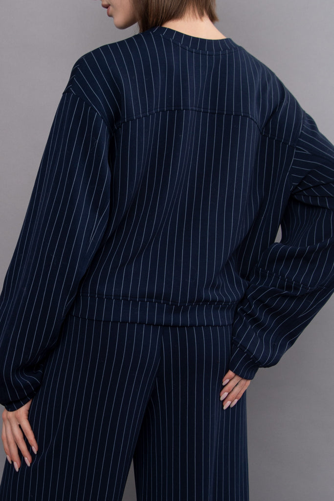 elevated navy blue and pale blue striped pullover with a boxy fit