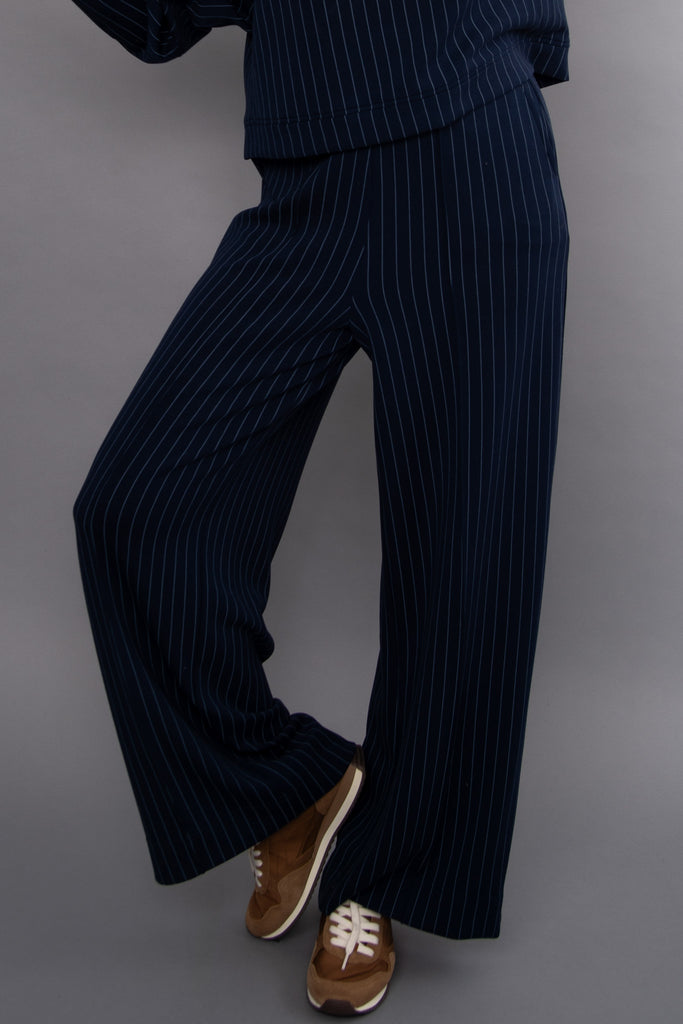 elevated navy blue and pale blue striped pull on pants with pintuck details