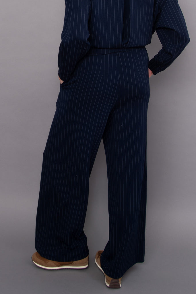 elevated navy blue and pale blue striped pull on pants with pintuck details