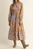 long sleeve midi dress in a pretty toffee brown and cornflower blue floral pattern.
