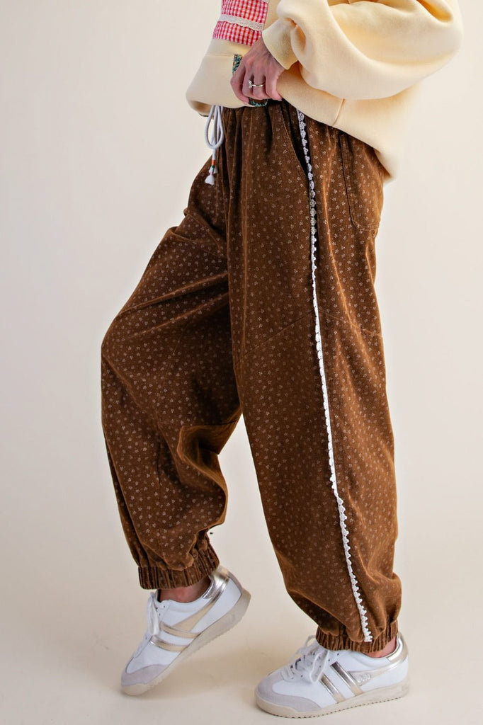 unique joggers made from camel brown baby corduroy with a sweet ditsy floral pattern