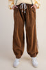 unique joggers made from camel brown baby corduroy with a sweet ditsy floral pattern