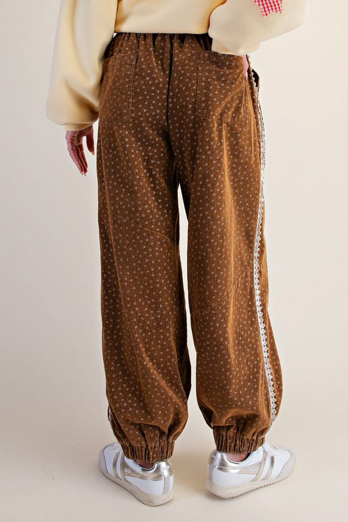 unique joggers made from camel brown baby corduroy with a sweet ditsy floral pattern