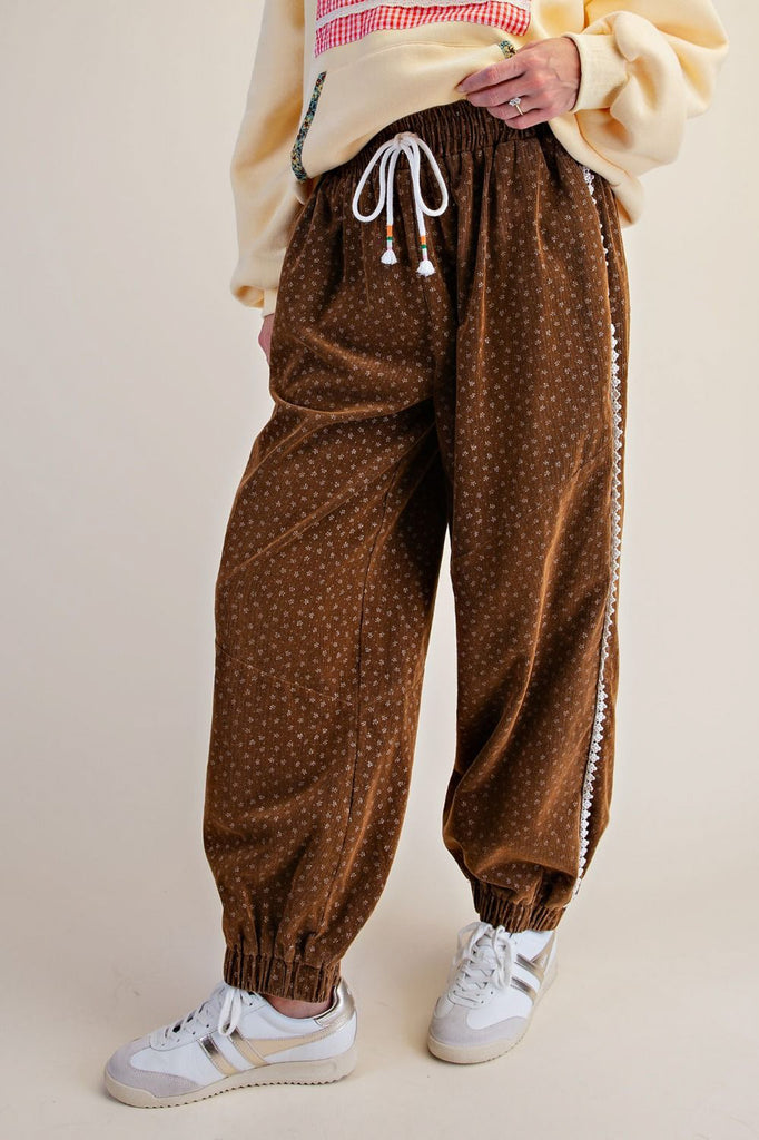 unique joggers made from camel brown baby corduroy with a sweet ditsy floral pattern