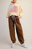 unique joggers made from camel brown baby corduroy with a sweet ditsy floral pattern