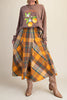 flowy midi skirt in a brown and orange plaid pattern