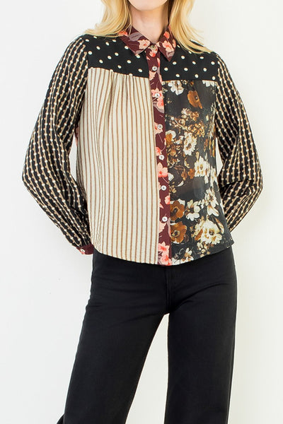 button down top with a striking mixed print design