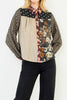 button down top with a striking mixed print design