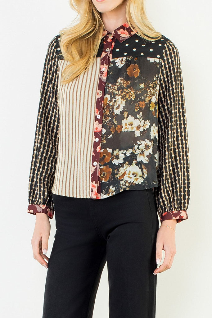 button down top with a striking mixed print design
