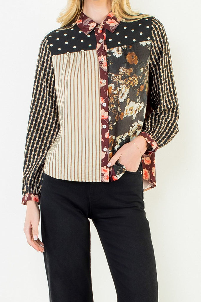button down top with a striking mixed print design