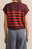 knit top in a deep wine color with bold orange stripes