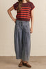 knit top in a deep wine color with bold orange stripes
