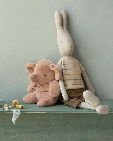 medium-sized elephant plush toy in vintage rose color