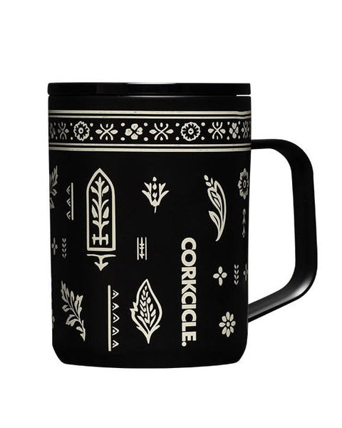black insulated mug with a western-inspired design