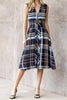 striking sleeveless midi dress in a dark plaid pattern with a special zippered front