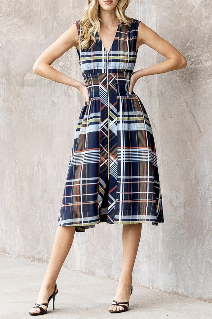 striking sleeveless midi dress in a dark plaid pattern with a special zippered front