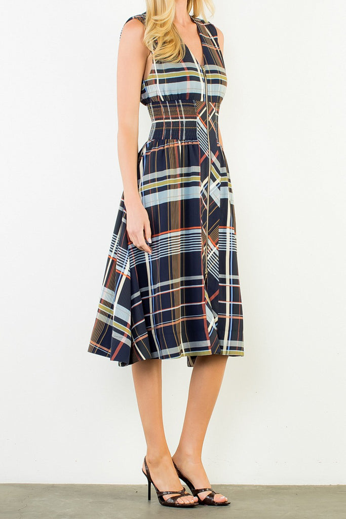striking sleeveless midi dress in a dark plaid pattern with a special zippered front