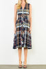 striking sleeveless midi dress in a dark plaid pattern with a special zippered front
