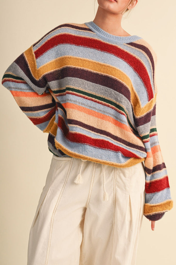 fuzzy oversized pullover with colorful stripes