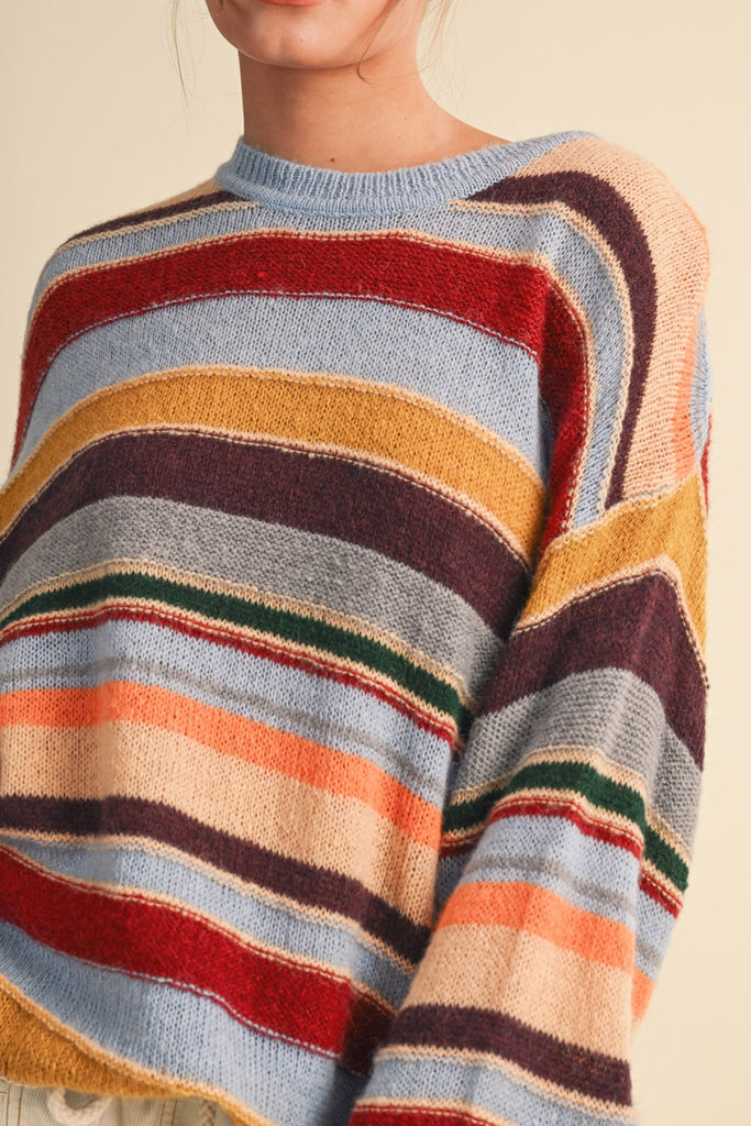 fuzzy oversized pullover with colorful stripes