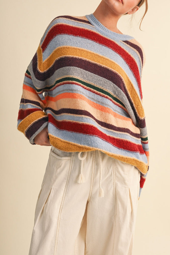 fuzzy oversized pullover with colorful stripes