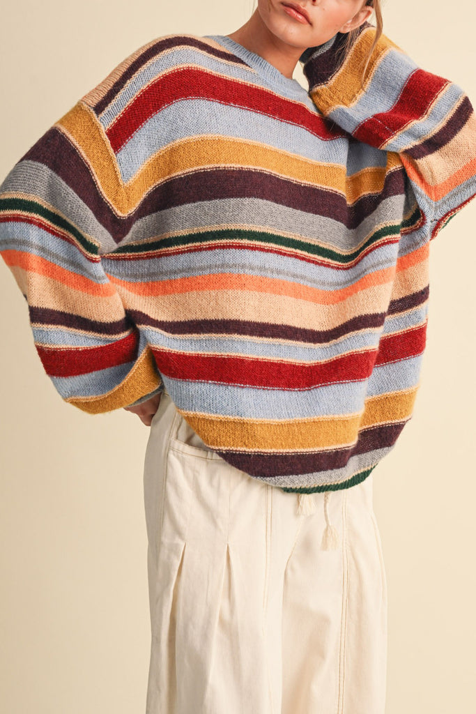 fuzzy oversized pullover with colorful stripes
