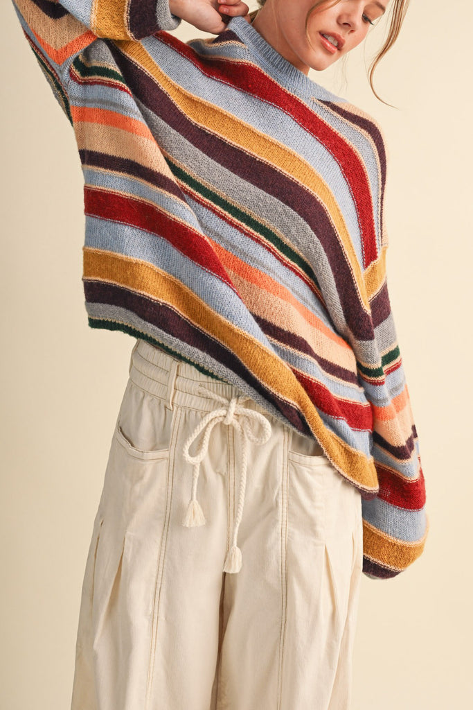 fuzzy oversized pullover with colorful stripes