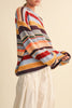 fuzzy oversized pullover with colorful stripes