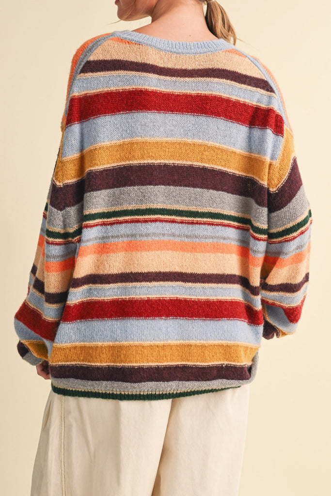 fuzzy oversized pullover with colorful stripes