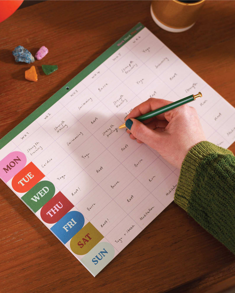weekly/monthly planner pad with a colorful design