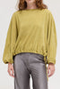 muted lime green velvet blouse with a unique crinkled texture.