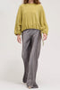 muted lime green velvet blouse with a unique crinkled texture.