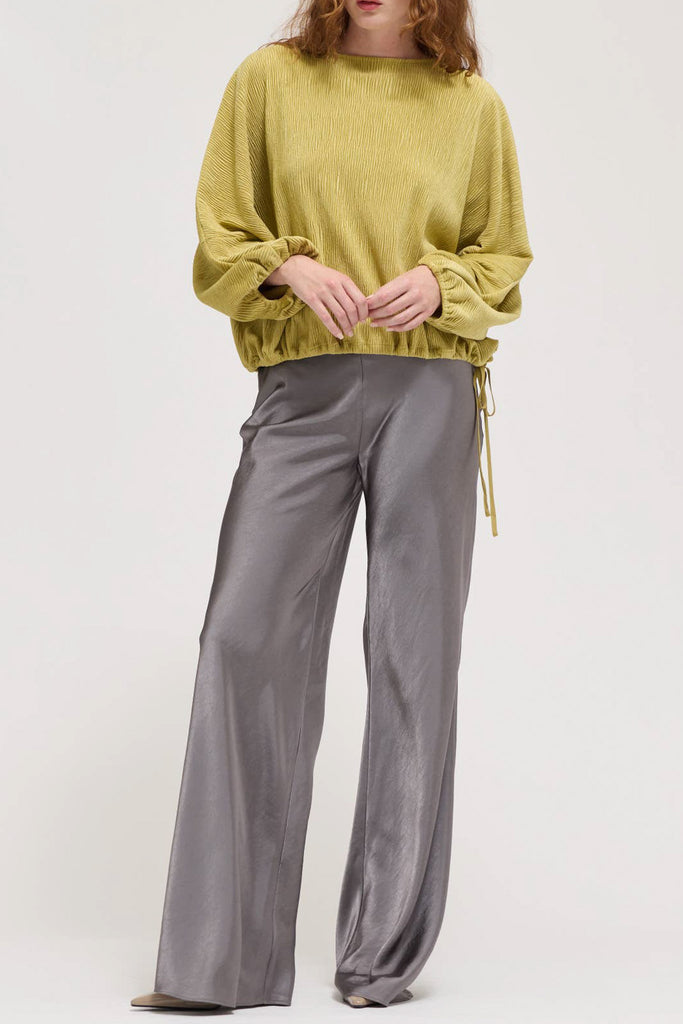 muted lime green velvet blouse with a unique crinkled texture.