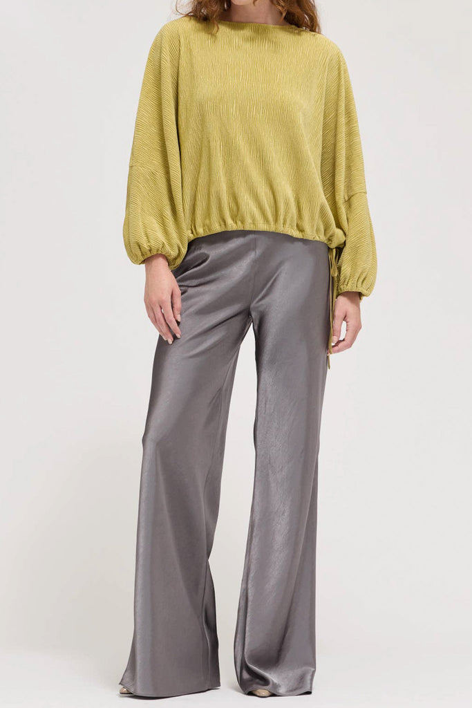 muted lime green velvet blouse with a unique crinkled texture.