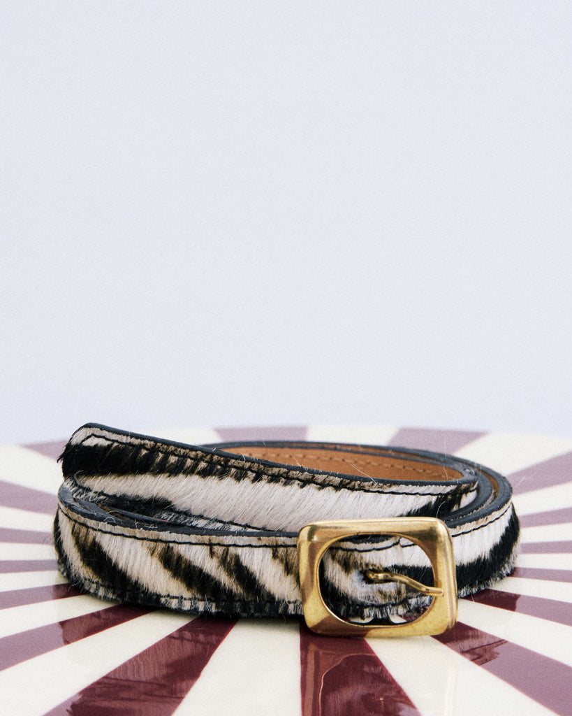 black cowhide belt with a gold buckle from frnch
