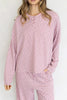 baby pink henley top with a sweet ditsy floral pattern