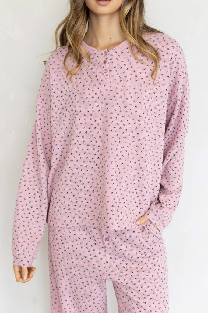 baby pink henley top with a sweet ditsy floral pattern