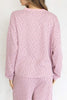 baby pink henley top with a sweet ditsy floral pattern