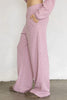 wide leg pull on pants in baby pink with a sweet ditsy floral pattern 