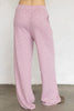 wide leg pull on pants in baby pink with a sweet ditsy floral pattern 