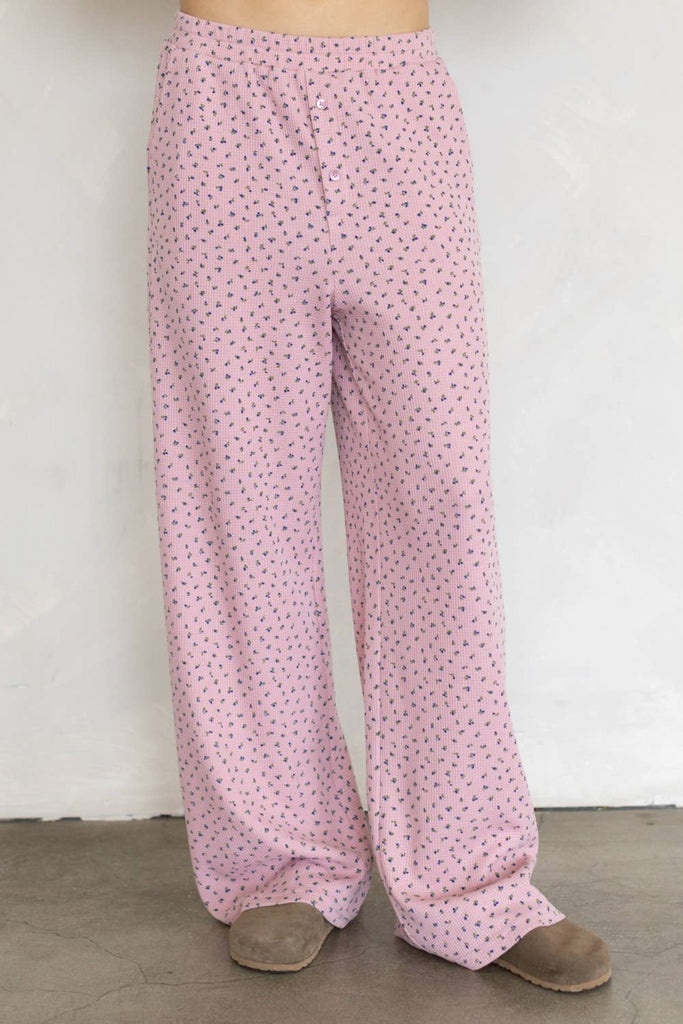 wide leg pull on pants in baby pink with a sweet ditsy floral pattern 